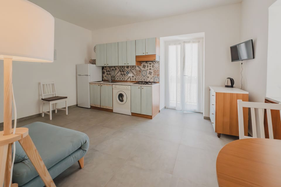 Apartment, Sea View | Private kitchen | Fridge, stovetop, coffee/tea maker, cookware/dishes/utensils