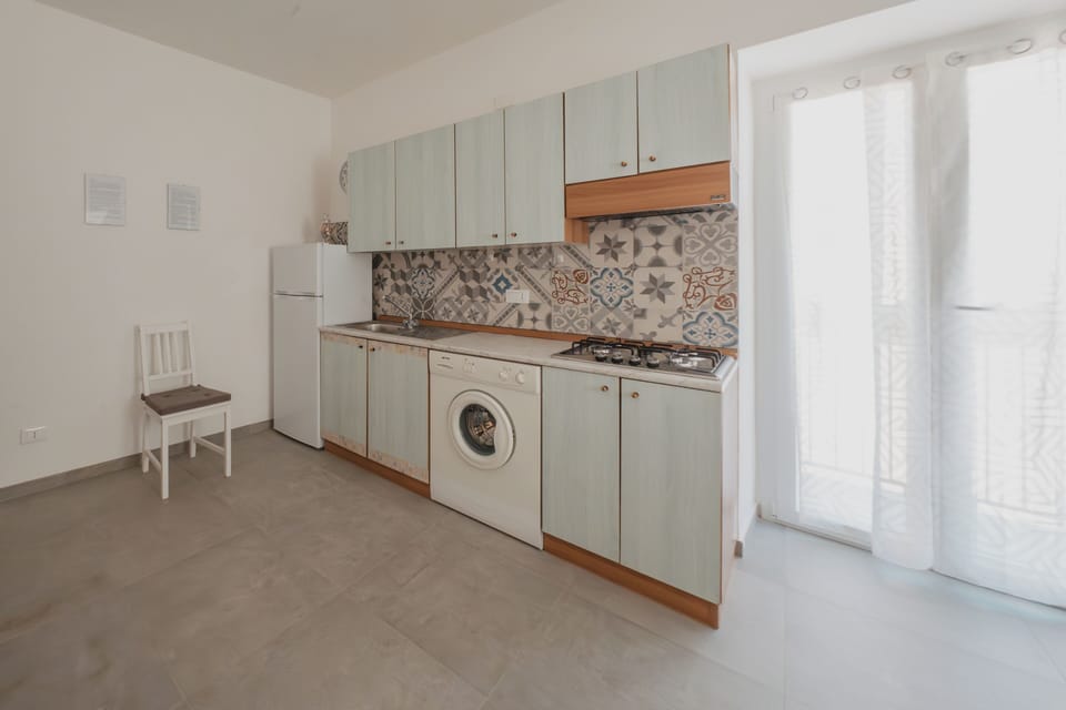 Apartment, Sea View | Private kitchen | Fridge, stovetop, coffee/tea maker, cookware/dishes/utensils