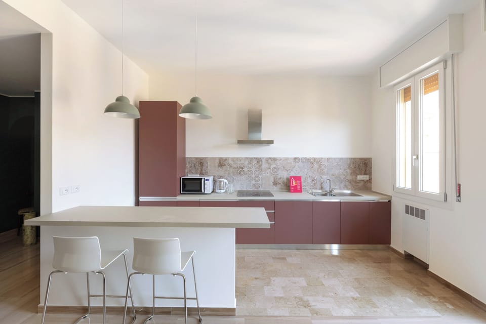 Condo | Private kitchen | Electric kettle, highchair, dining tables
