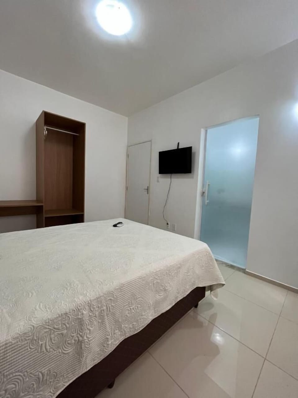 Economy Double Room | Desk, laptop workspace, blackout drapes, iron/ironing board