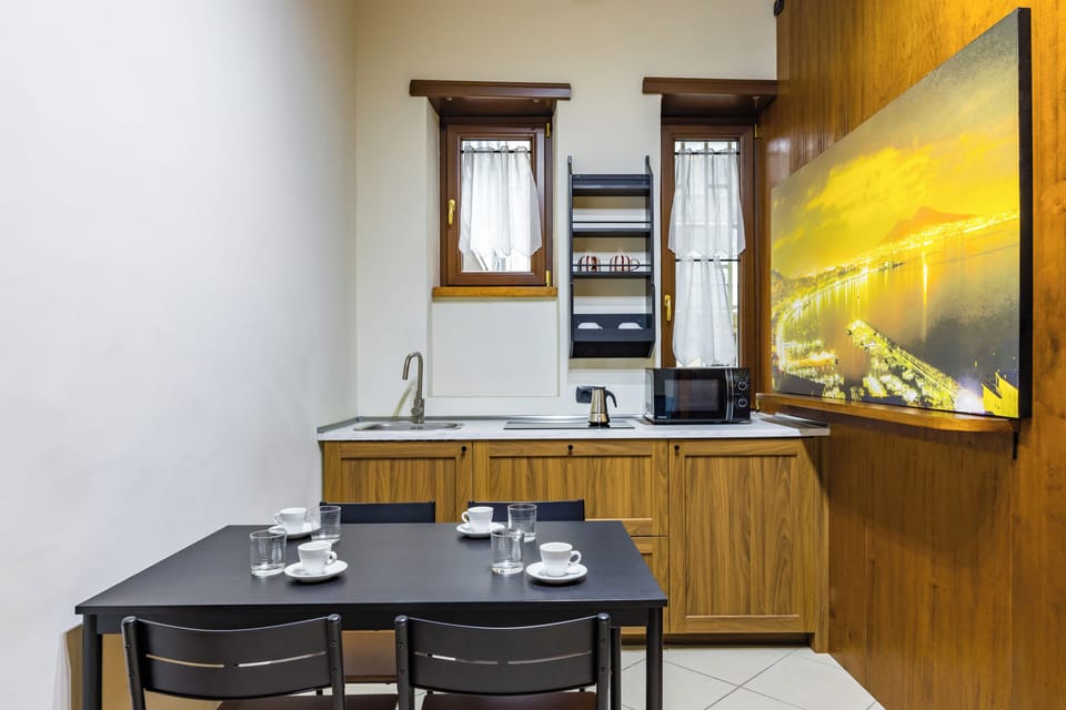 Apartment | Private kitchen | Fridge, coffee/tea maker, electric kettle, highchair