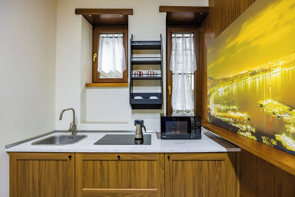 Apartment | Private kitchen | Fridge, coffee/tea maker, electric kettle, highchair