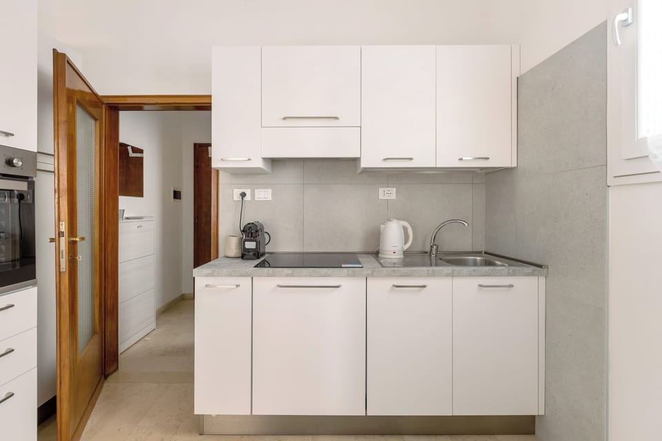 Apartment | Private kitchen | Fridge, oven, stovetop, dishwasher