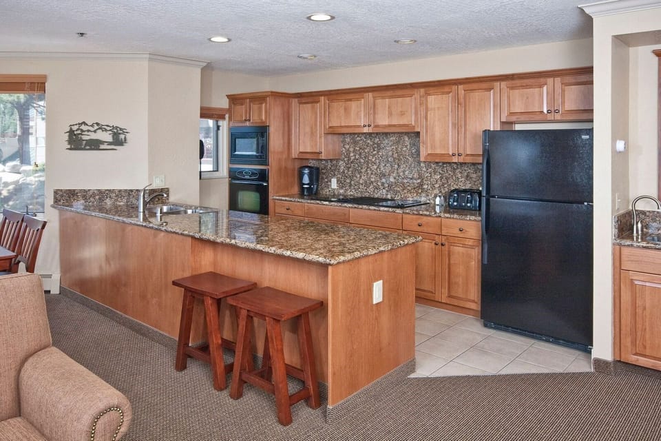 Cook up a storm in the fully-equipped kitchen with modern appliances.