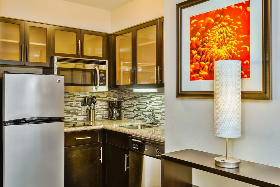 Curb your appetite by cooking a meal in your kitchen.