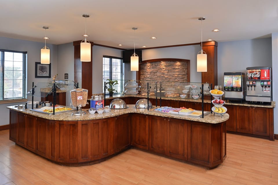 Breakfast bar with hot food and beverage options.
