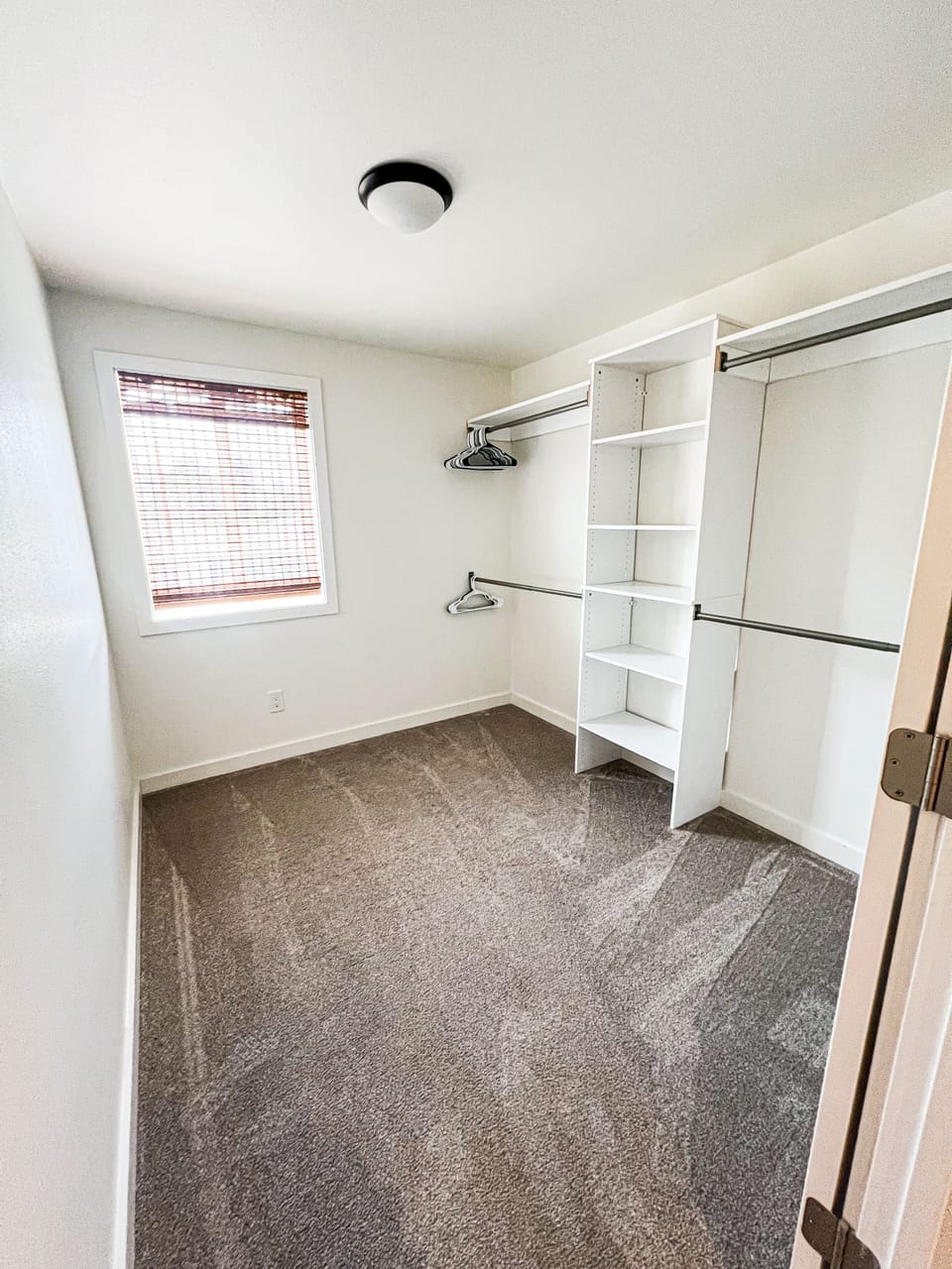 primary closet with room to set up a pack-n-play if kids need to be near primary