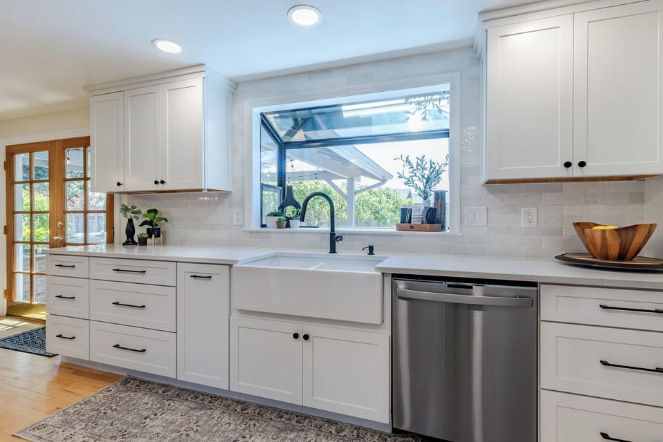 farmhouse sink, newer dishwasher, bay window