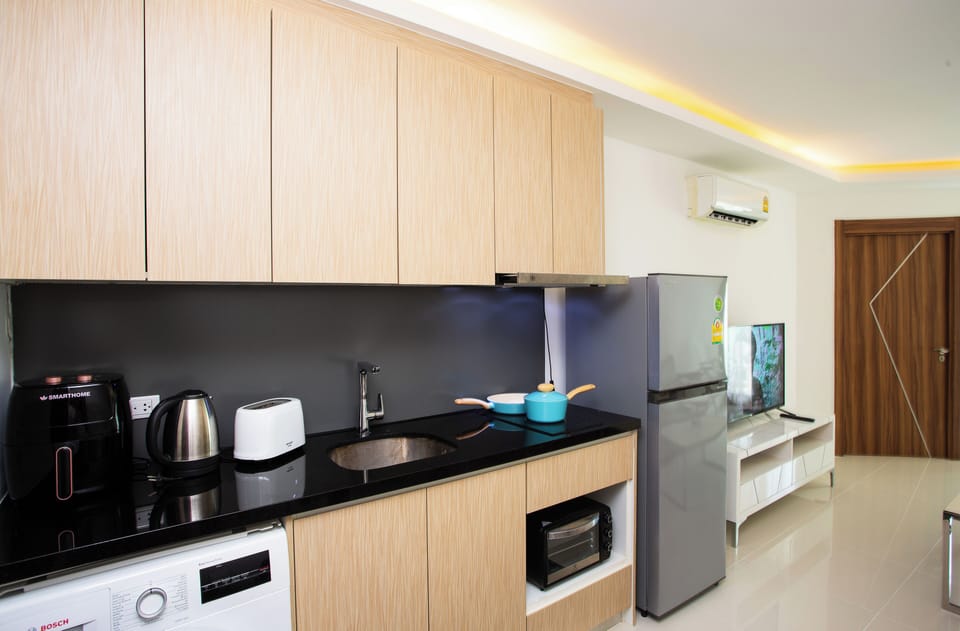 Family Apartment, Pool View | Room amenity