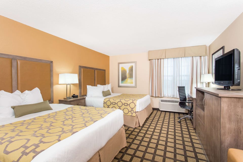 Room, 2 Queen Beds, Non Smoking | Desk, blackout drapes, iron/ironing board, free cribs/infant beds