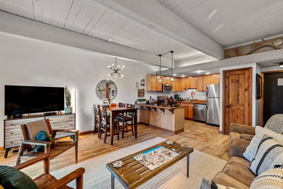 This beautifully designed open layout offers effortless flow and warm mountain-home charm.