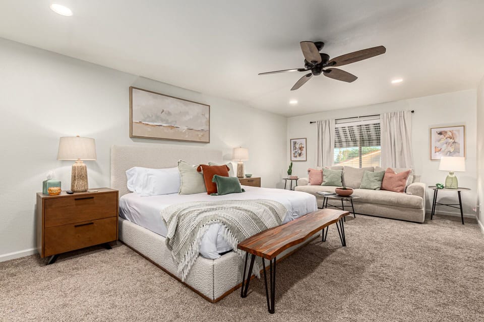Enormous Primary Suite with King Bed and Seating Area