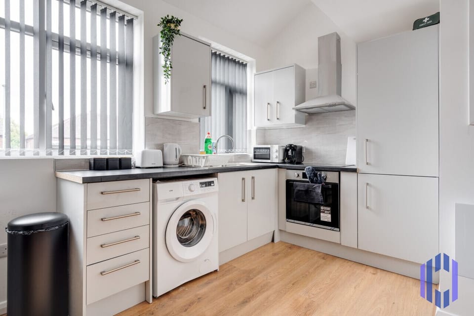 Kitchen. Fully equipped with cooking equipment perfect for families. Appliances such as fridge freezer, microwave, cooker, oven, dishwasher Toaster are free and available for your use.