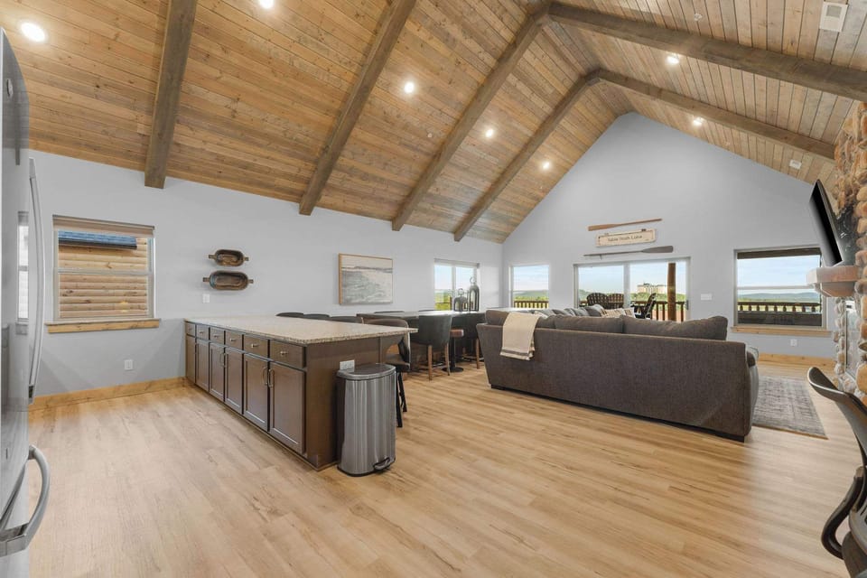 This grand living room boasts of vaulted ceilings and lots of room!
