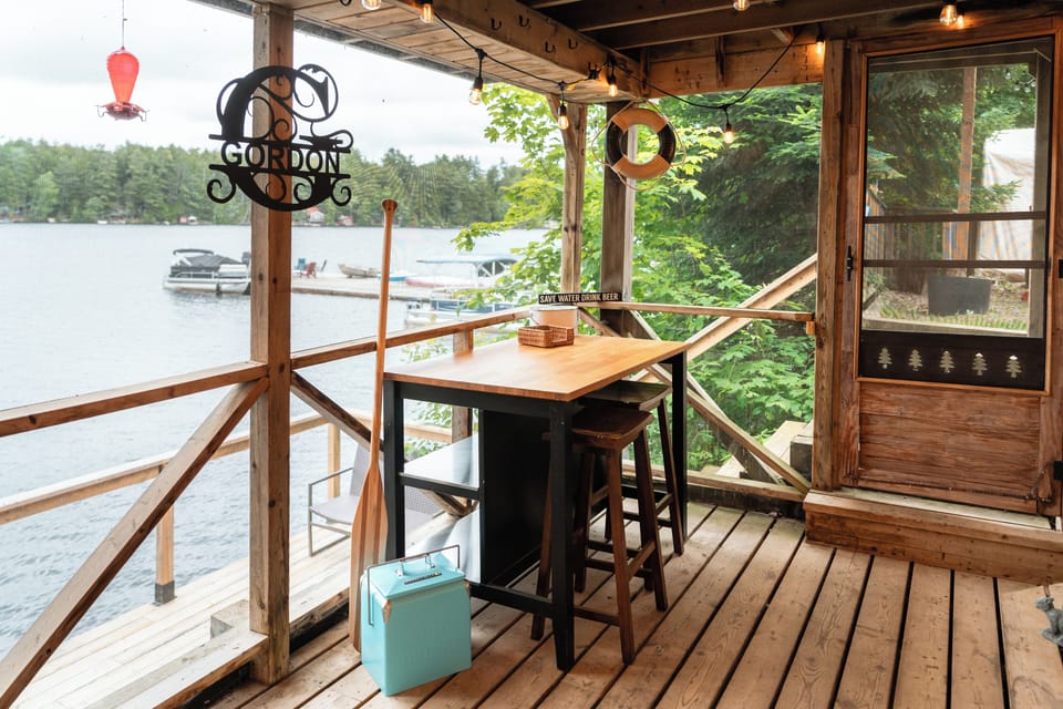 Gordon's Bar overlooking the lake in the screen room where the Hot Tub is situated. 
