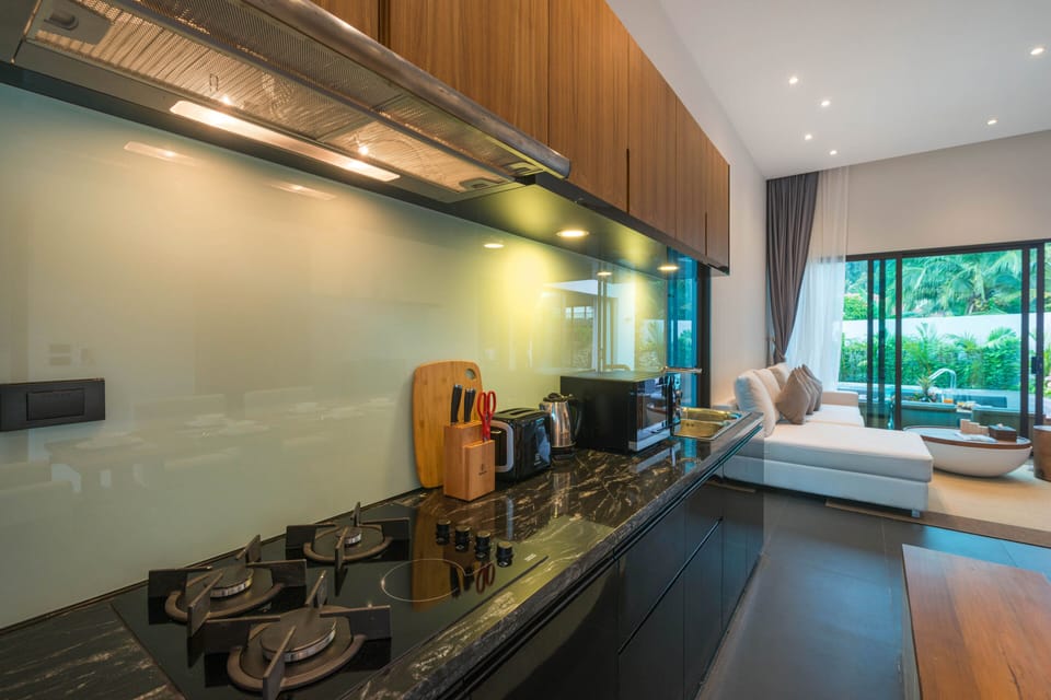 Premium Villa, Garden View | Private kitchen | Fridge, microwave, stovetop, coffee/tea maker