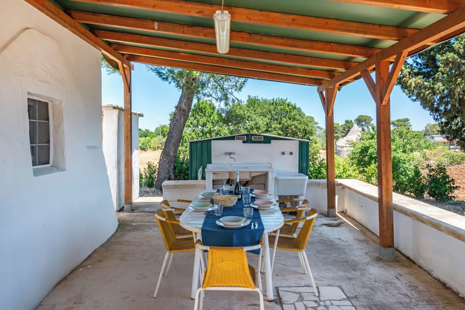 Family Villa, 1 Bedroom, Microwave, Mountainside (Trullo del Bosco In Martina Franca) | Outdoor dining