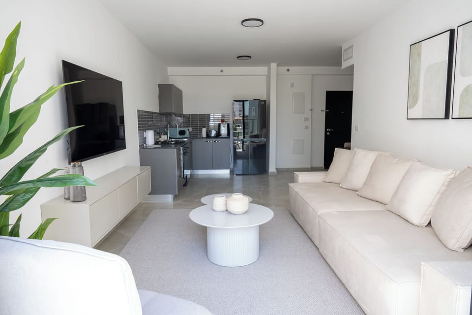 Exclusive Apartment | Living area | TV