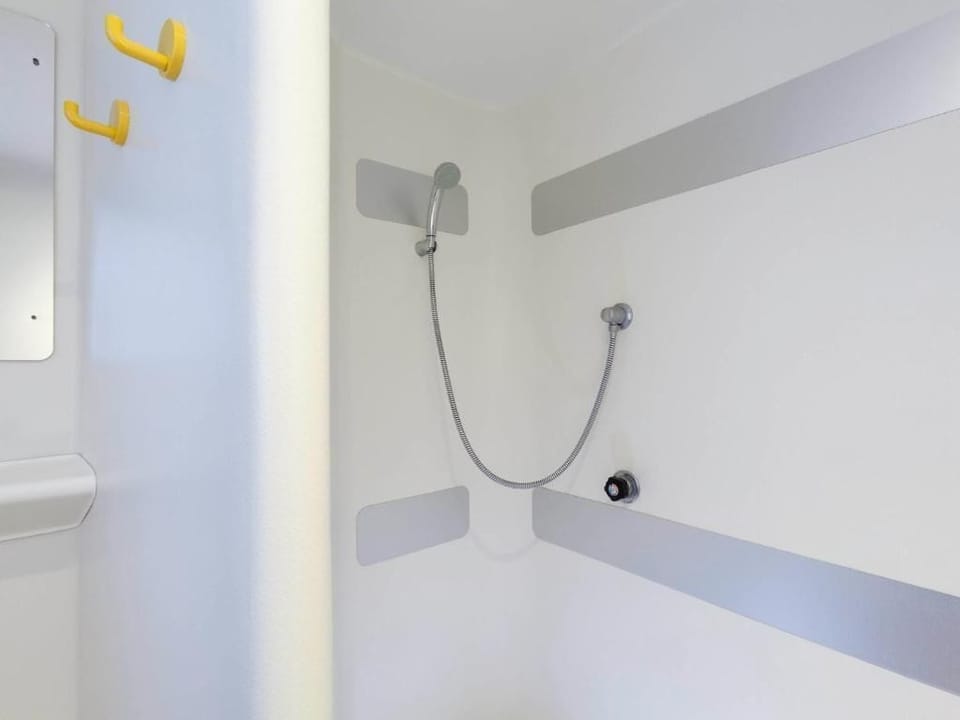 Shower, rainfall showerhead, towels