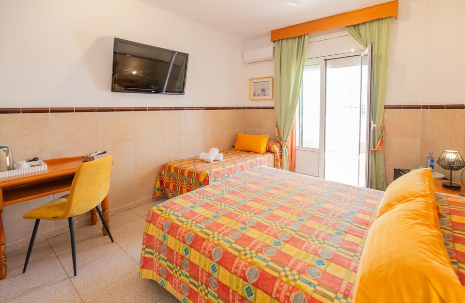 Triple With Terrace and Air Conditioning | Desk, free WiFi, bed sheets