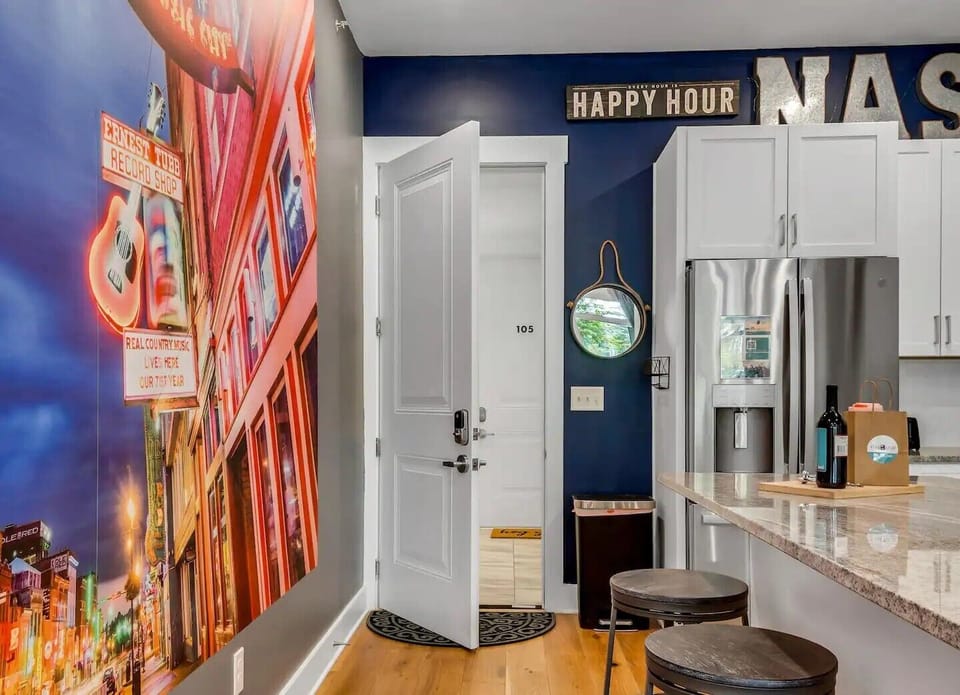 Main Entrance with 3 Barstools around Island