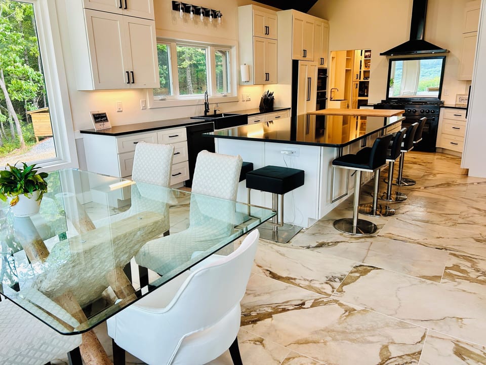 Kitchen table and island seating.