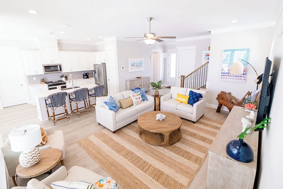 Step into the bright and inviting living room of Sunkissed & Salty
