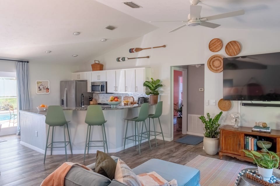 Granite countertops and stainless appliances with a convection oven and K cups. 