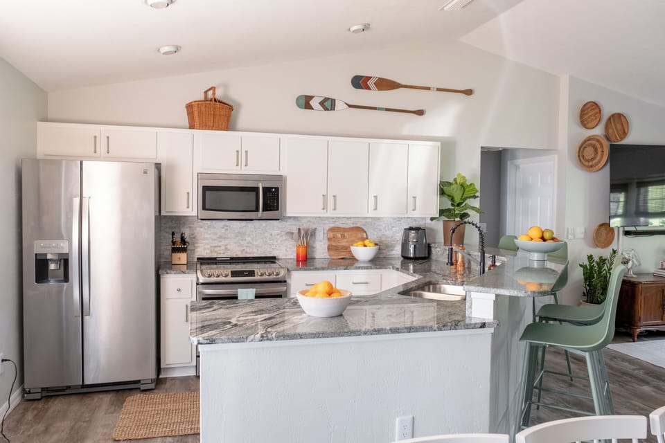 Fully stocked. Keurig/drip coffee, induction stove, full spice rack, dishwasher.