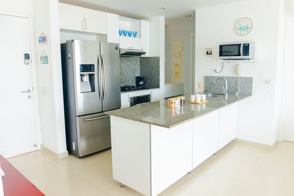 Apartment | Private kitchen | Full-size fridge, microwave, stovetop, espresso maker