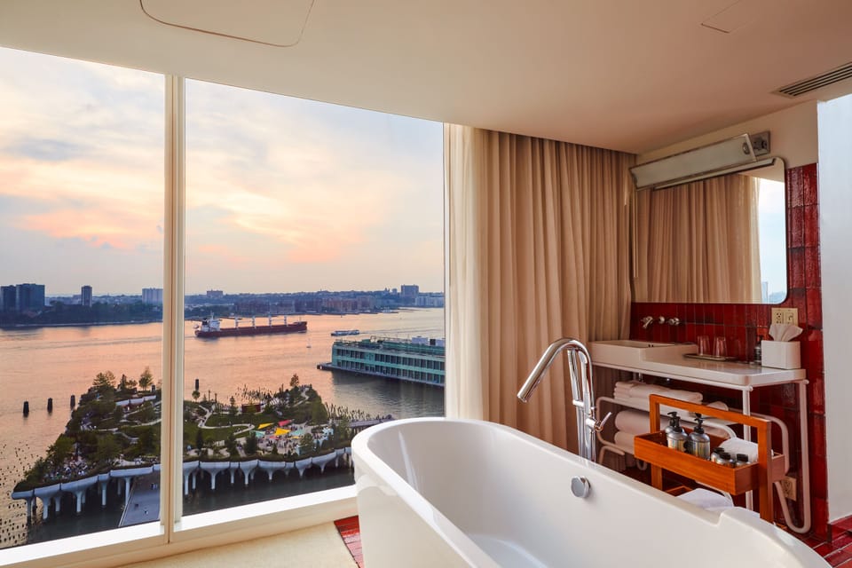 Designer toiletries, hair dryer, bathrobes, towels