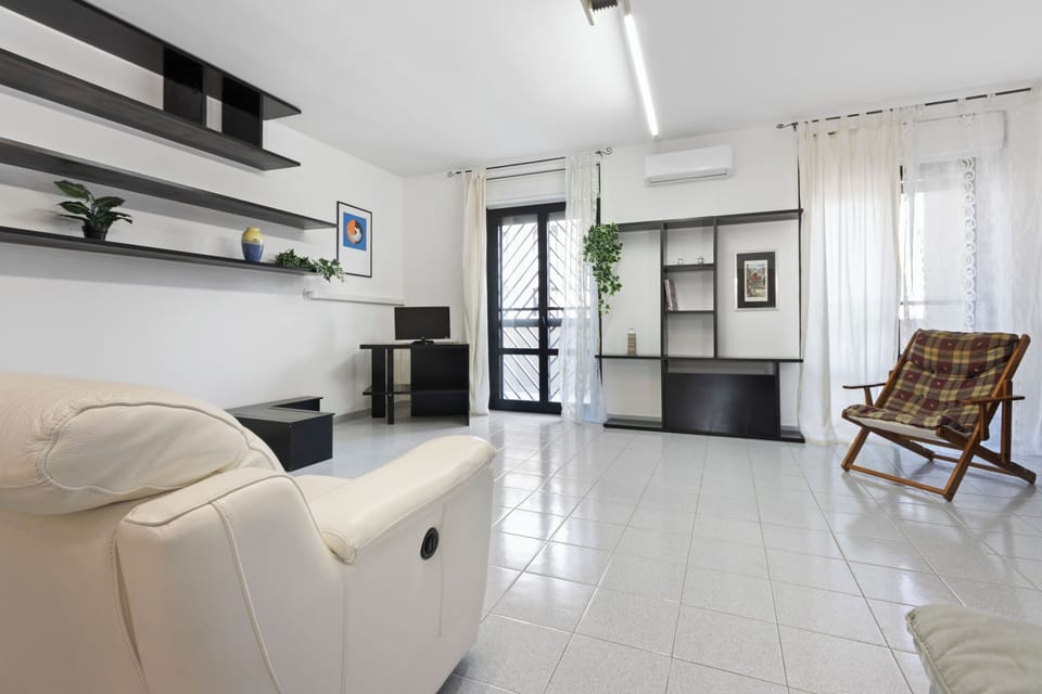 Apartment, Balcony | Living area | 35-inch TV with digital channels