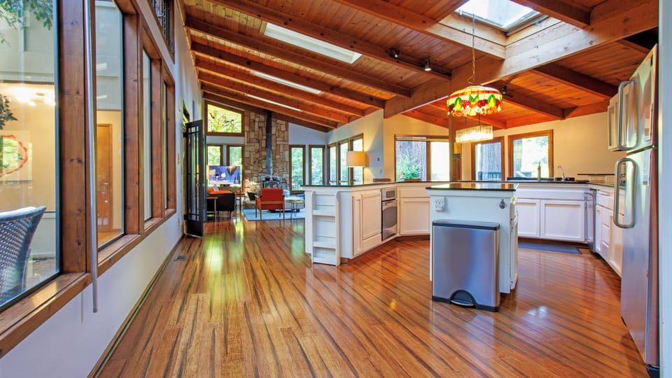 Open floor plan marries kitchen, dining area and living space.