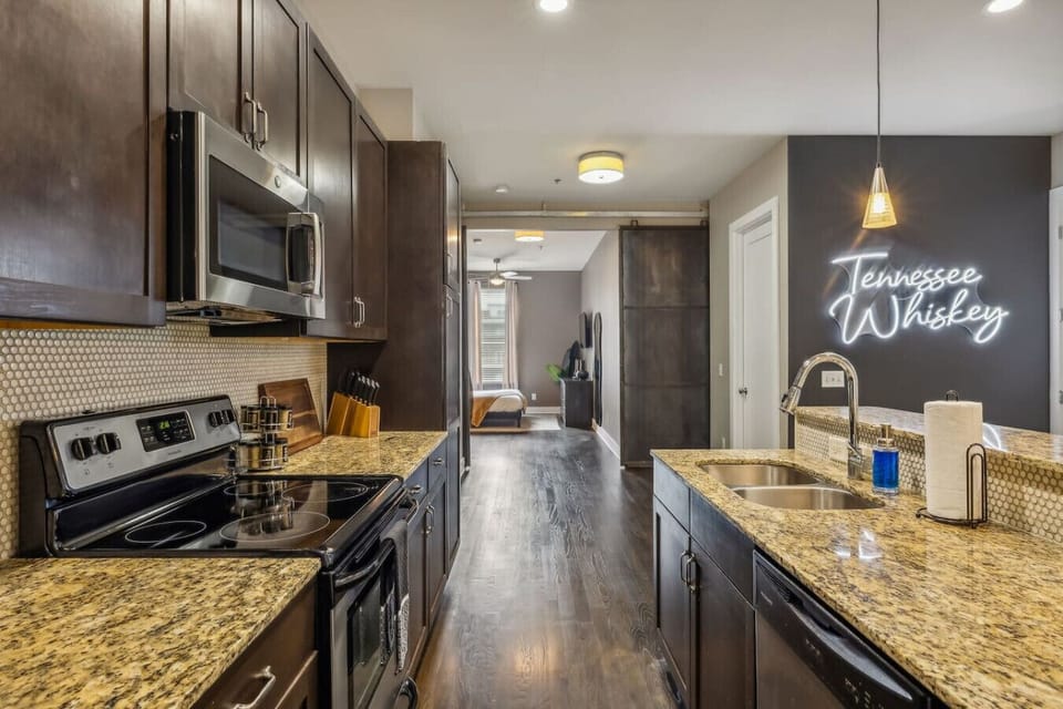 Spacious kitchen with granite countertops and everything you need to feel at home