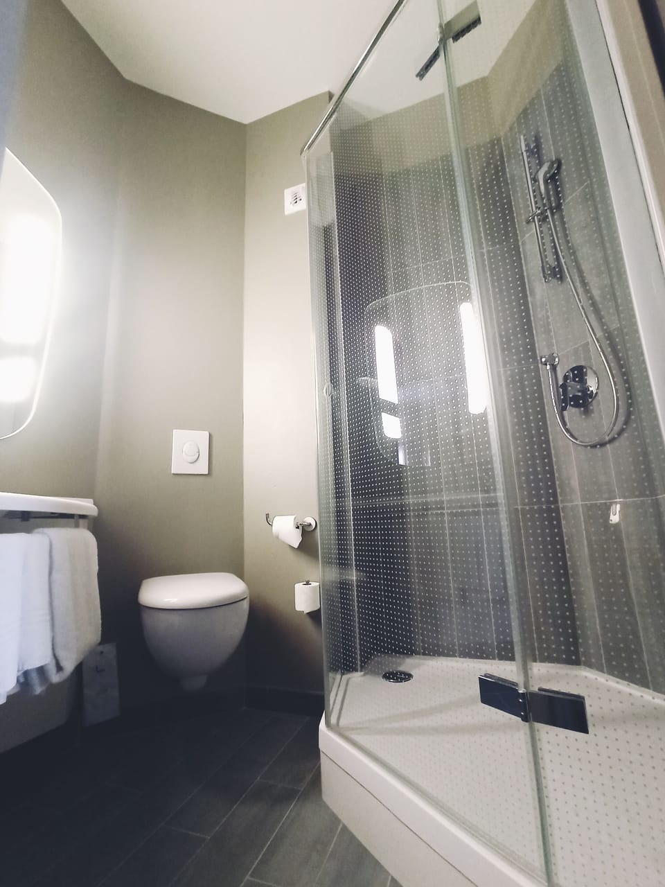 Shower, eco-friendly toiletries, hair dryer, towels