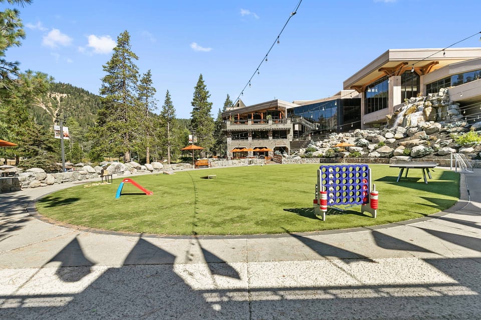 Exterior: Yard games, spacious green space, outdoor lighting
