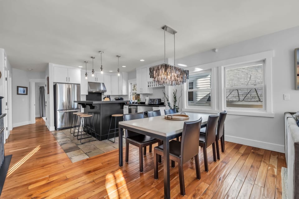 Kitchen and Dining Room: Fully equipped kitchen, 6-person dining table, open layout with kitchen and living room