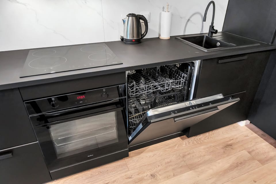 Comfort Apartment, Balcony, Courtyard View | Private kitchen | Fridge, oven, stovetop, dishwasher