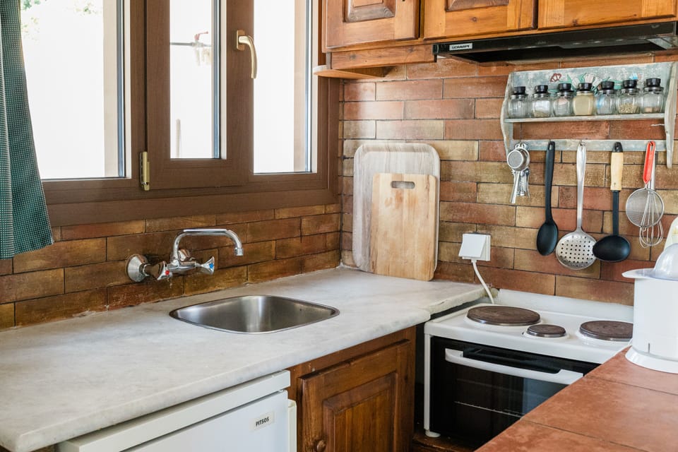 Studio, Sea View | Private kitchen | Full-size fridge, microwave, oven, stovetop