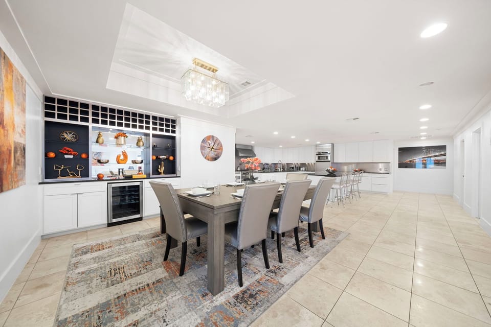 Spacious dining table that sits 8 with full tableware and silverware included.
