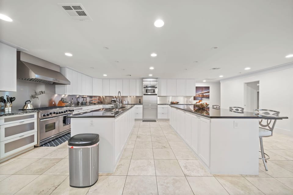 Huge commercial kitchen with commercial appliances and 2 large kitchen islands 