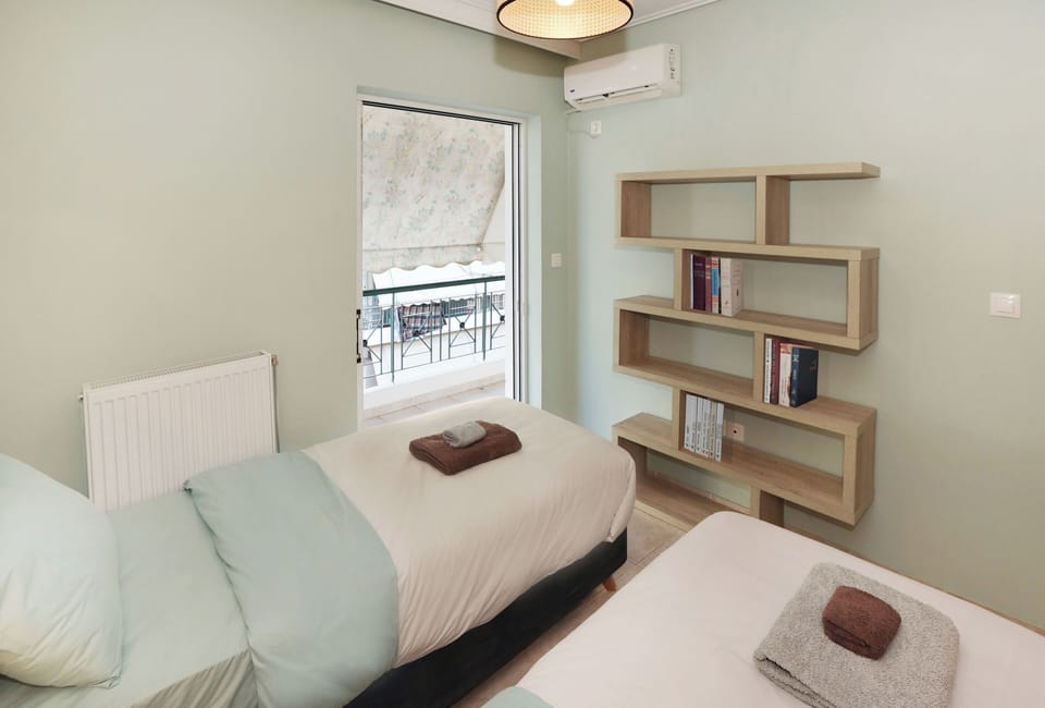 Family Apartment, 2 Bedrooms, City View | 2 bedrooms, desk, laptop workspace, iron/ironing board