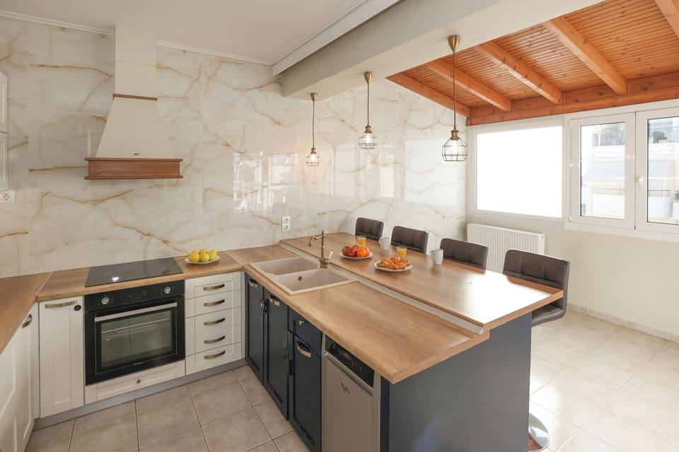 Family Apartment, 2 Bedrooms, City View | Private kitchen | Fridge, microwave, oven, stovetop