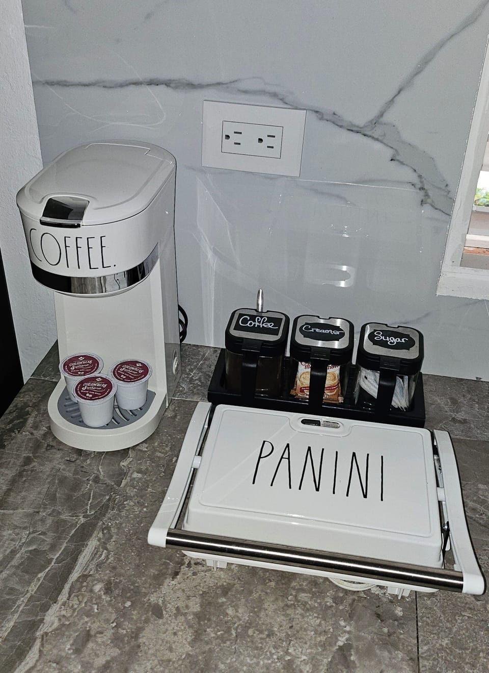 Panni grill, coffee machine, starter k-pods, coffee, sugar and creamer included