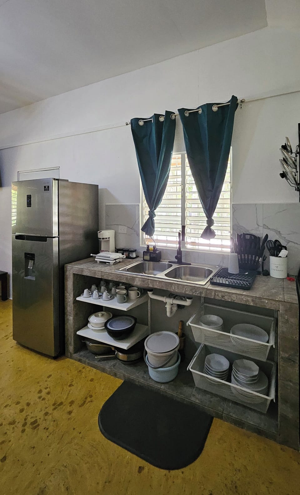 Full kitchen, refrigerator,double sink, panini press and more