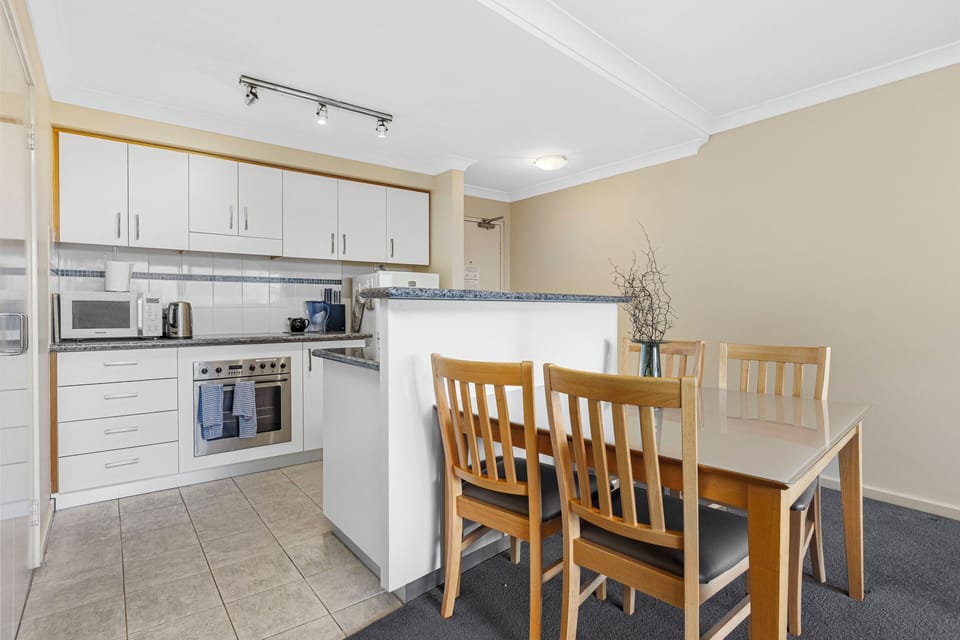 Enjoy the convenience of our well-appointed kitchen and dining area, perfect for preparing and enjoying meals during your stay. 