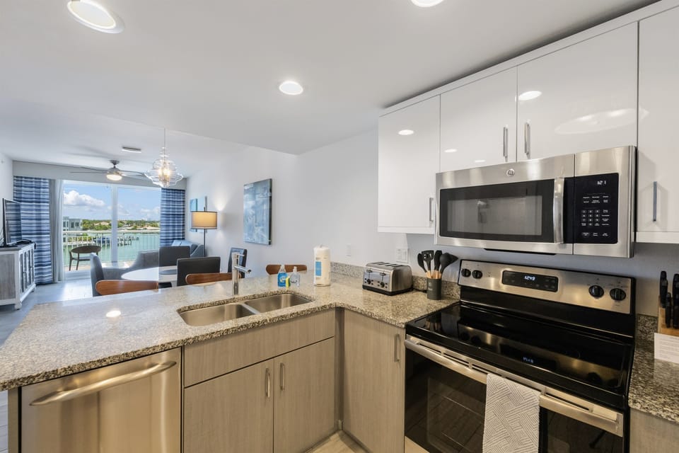 Kitchen, fully stocked with cooking/eating utensils