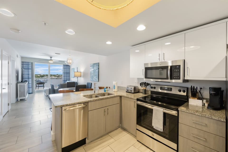 Kitchen, fully stocked with cooking/eating utensils