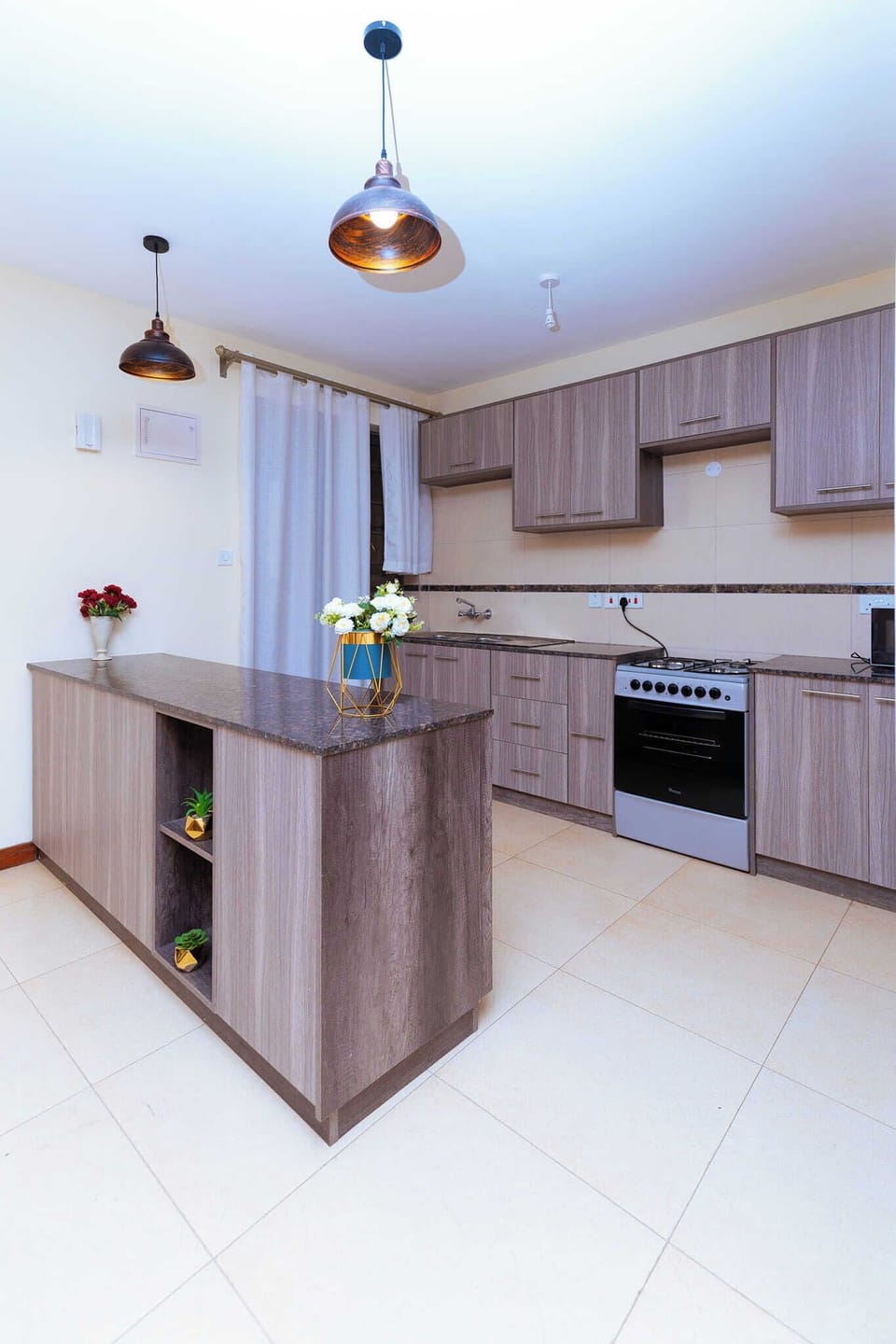 Family Apartment | Private kitchen | Fridge, microwave, cookware/dishes/utensils, dining tables
