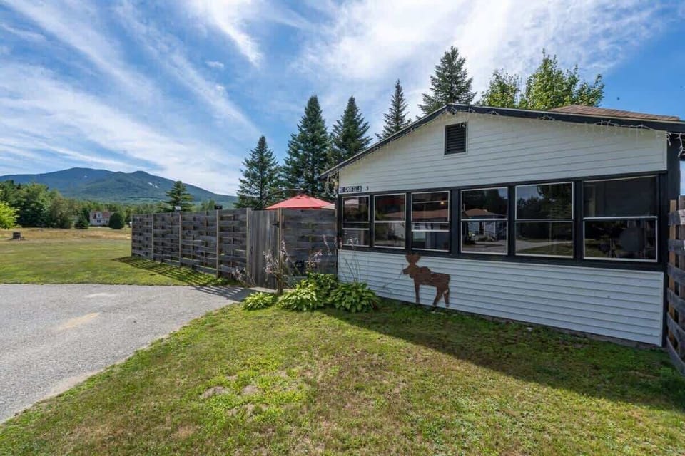 Exterior: Picturesque mountain views and a charming patio for outdoor relaxation!